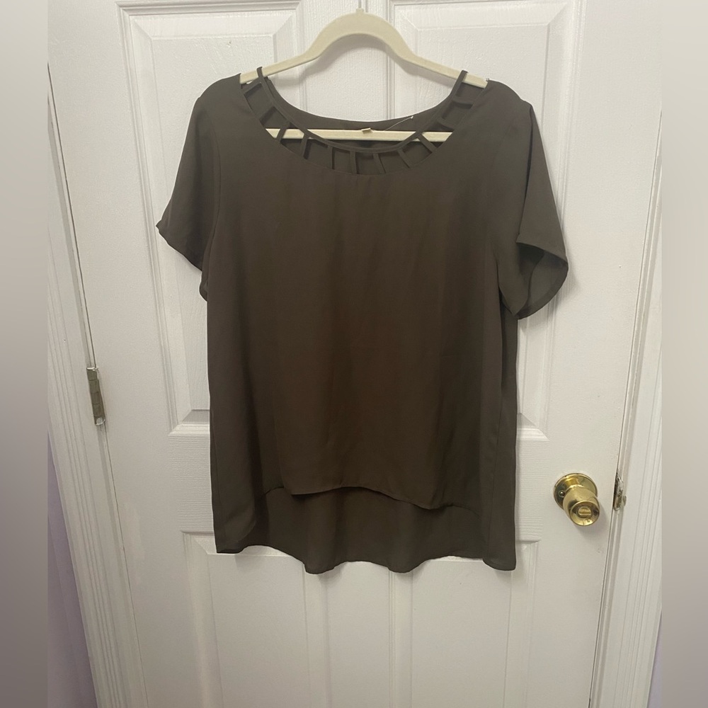 Olive Green Blouse with cutout neckline.